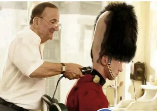 English King's guard getting a buzzcut from the barber. Thing is, that really tall furry thing isn't his hat, his head is just really tall.